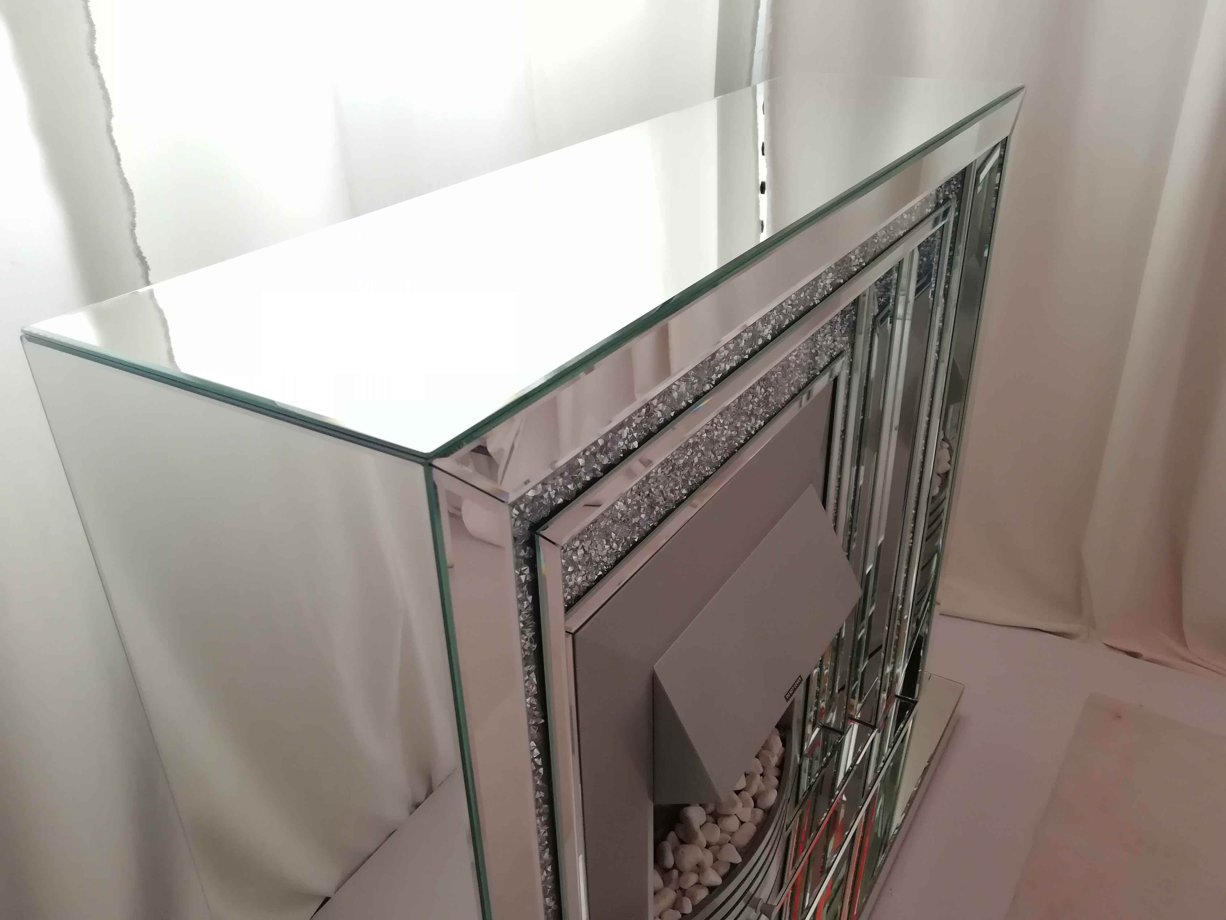 glass fireplace surround الموقد الزجاجي المحيط
